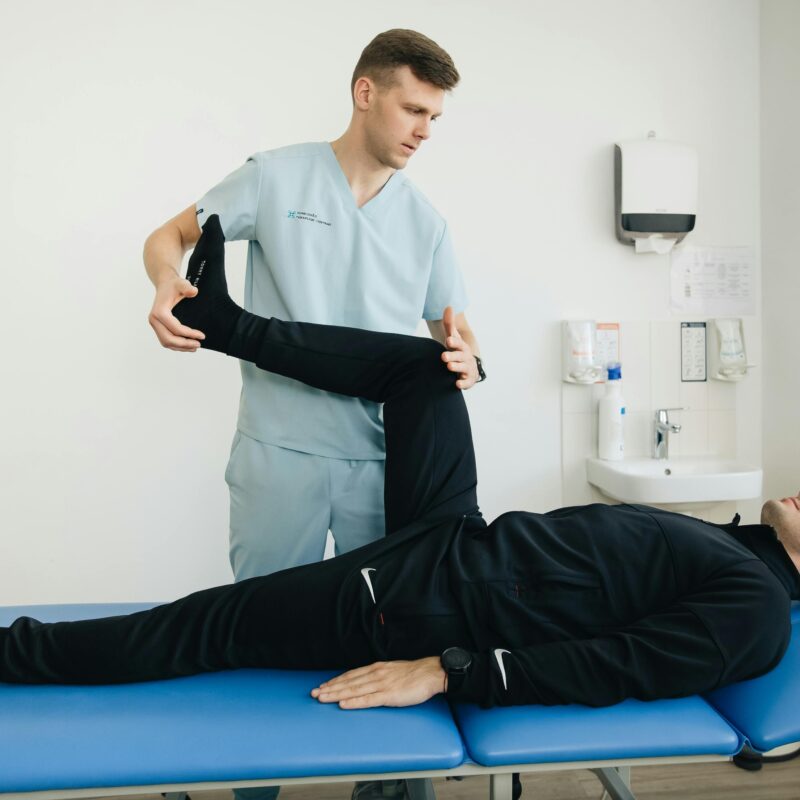 Man getting treatment for knee pain